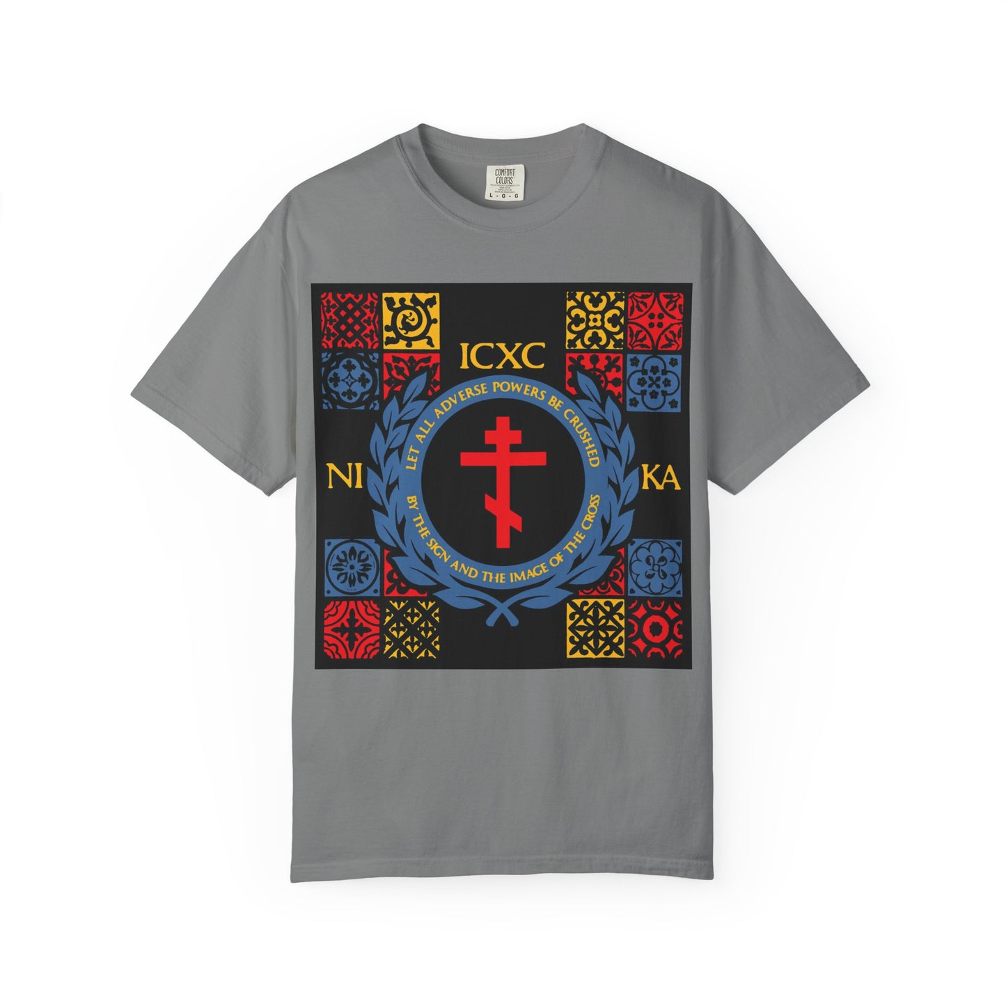 Grey heavyweight cotton unisex t-shirt named "Let All Adverse Powers Be Crushed" (Red, Yellow & Blue Design) featuring a medieval tile-inspired square pattern with a central ICXC NIKA cross, surrounded by Greek text.