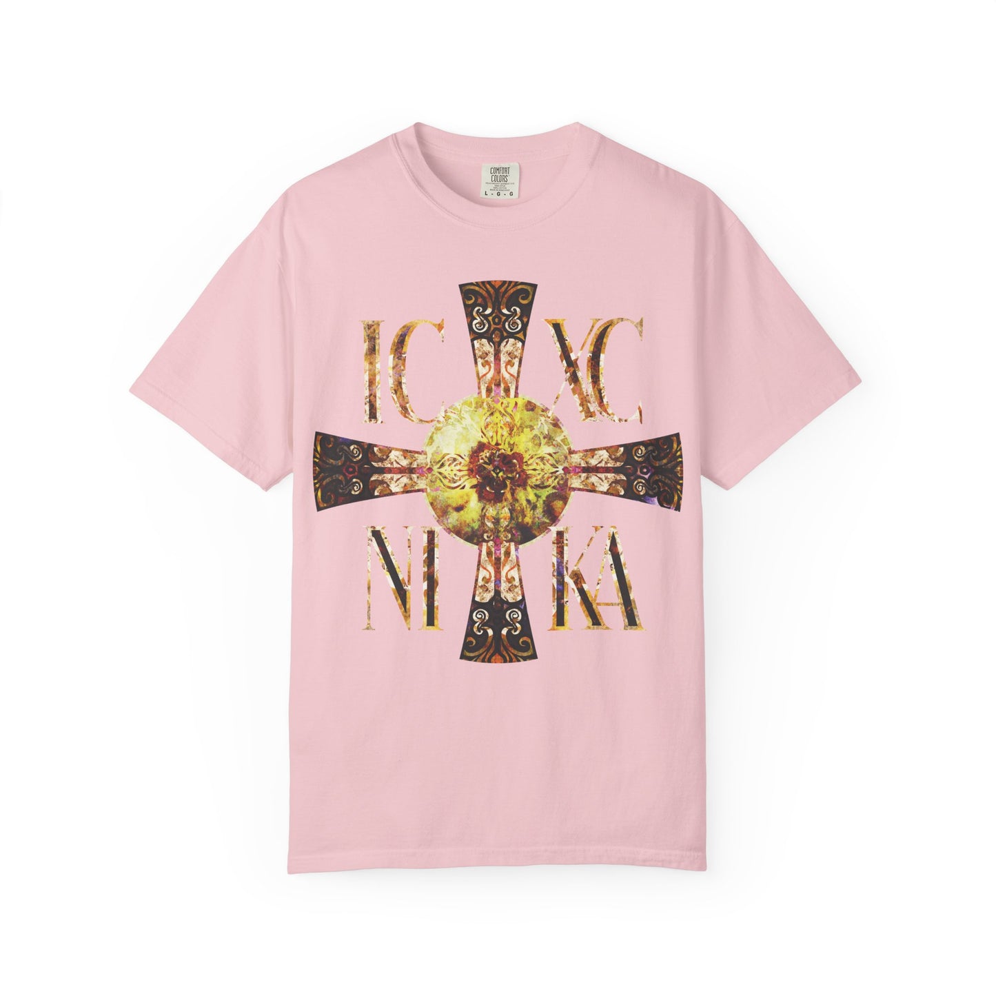 Blossom-hued heavyweight cotton tee featuring a Celtic-style equal-armed ICXC NIKA cross with a bright solar texture—a design reflecting Orthodox tradition and the everlasting light of the Theotokos.