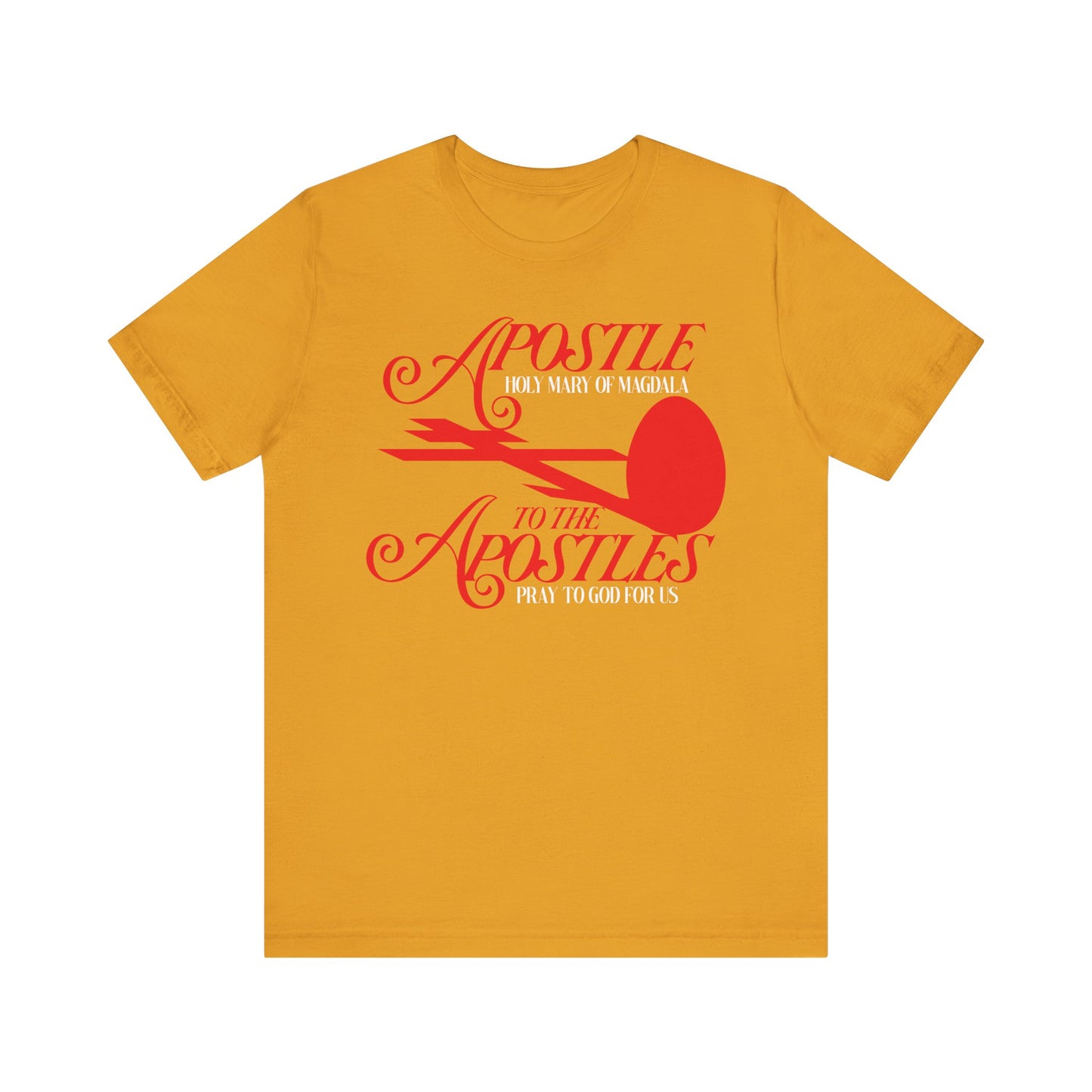 Mustard cotton tee featuring red cross and egg graphics with "Apostle to the Apostles" text, celebrating St. Mary Magdalene and Orthodox Christian tradition. Unisex, lightweight, inspired by the Feast of Passover.