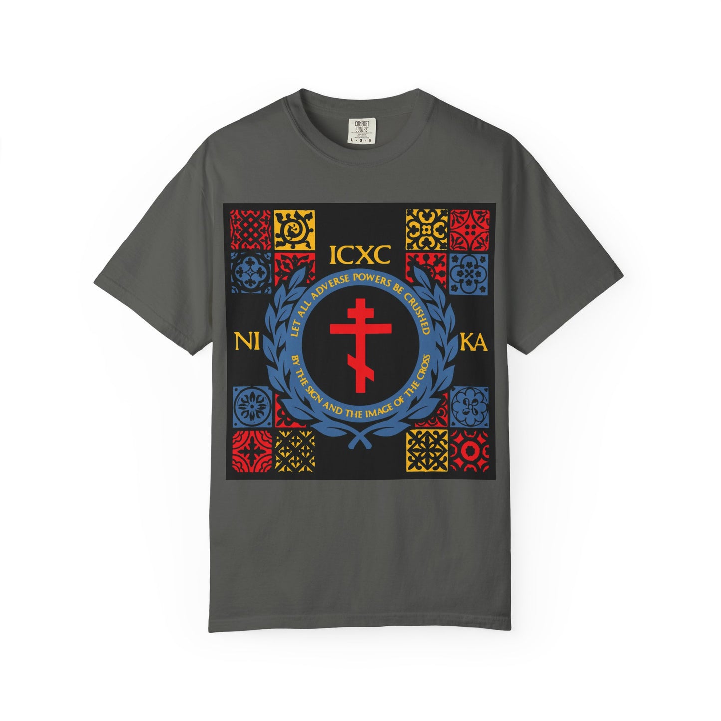 Pepper-colored heavyweight cotton unisex T-shirt featuring the "Let All Adverse Powers Be Crushed" design with a bold red cross, vibrant medieval tile patterns in red, yellow, and blue, and the Greek letters ICXC NIKA—perfect for anyone inspired by Katavasia chants or the striking symbolism of the Red Sea.