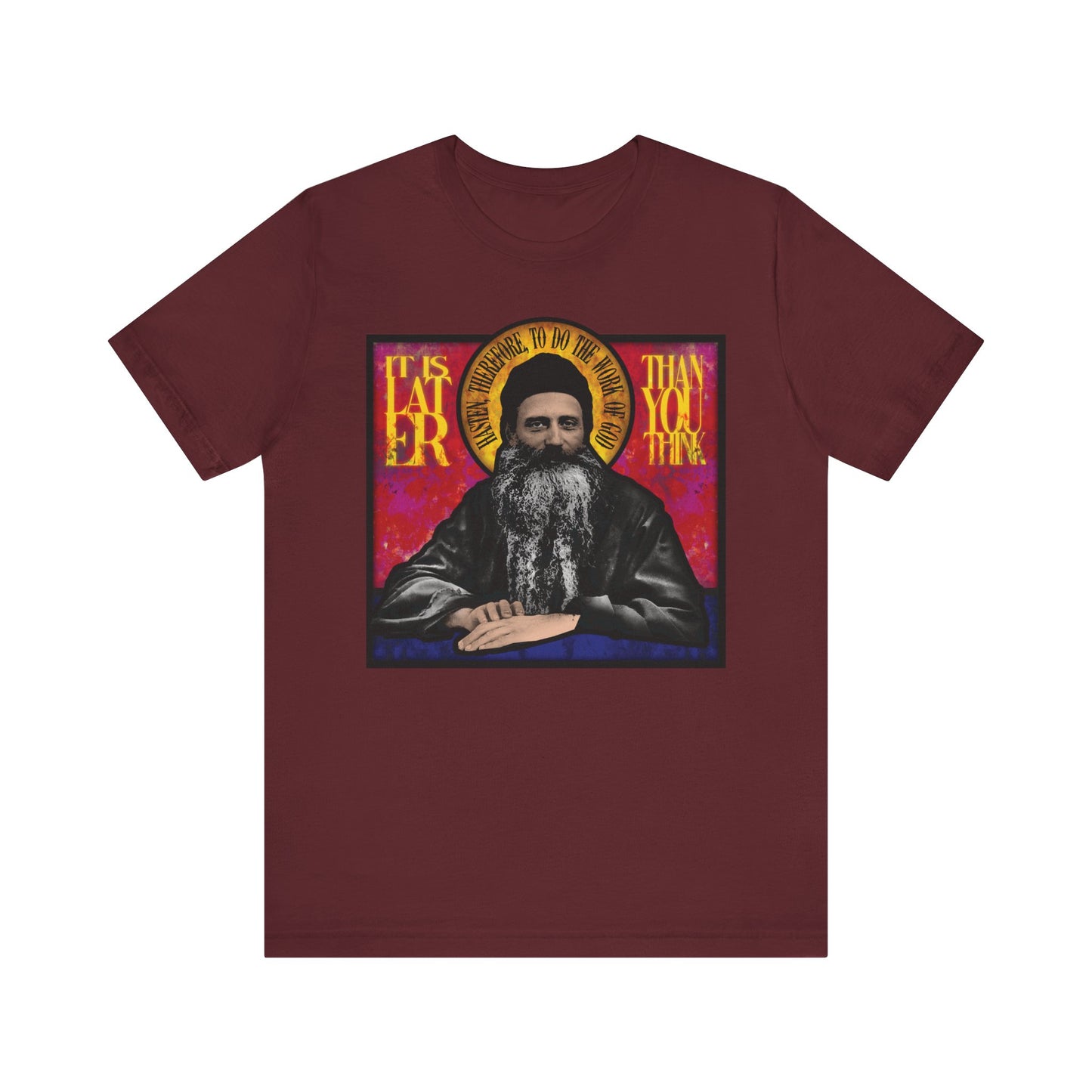 Maroon lightweight cotton unisex T-shirt featuring stained glass art of Fr. Seraphim Rose with "It is later than you think"—a subtle nod to salvation. Inspired by American Orthodox monastic saint.