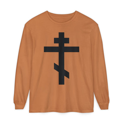 Yam-colored long-sleeve shirt featuring a large black Orthodox cross and Galatians 6:14: "May I never boast, except in the cross of our Lord Jesus Christ.