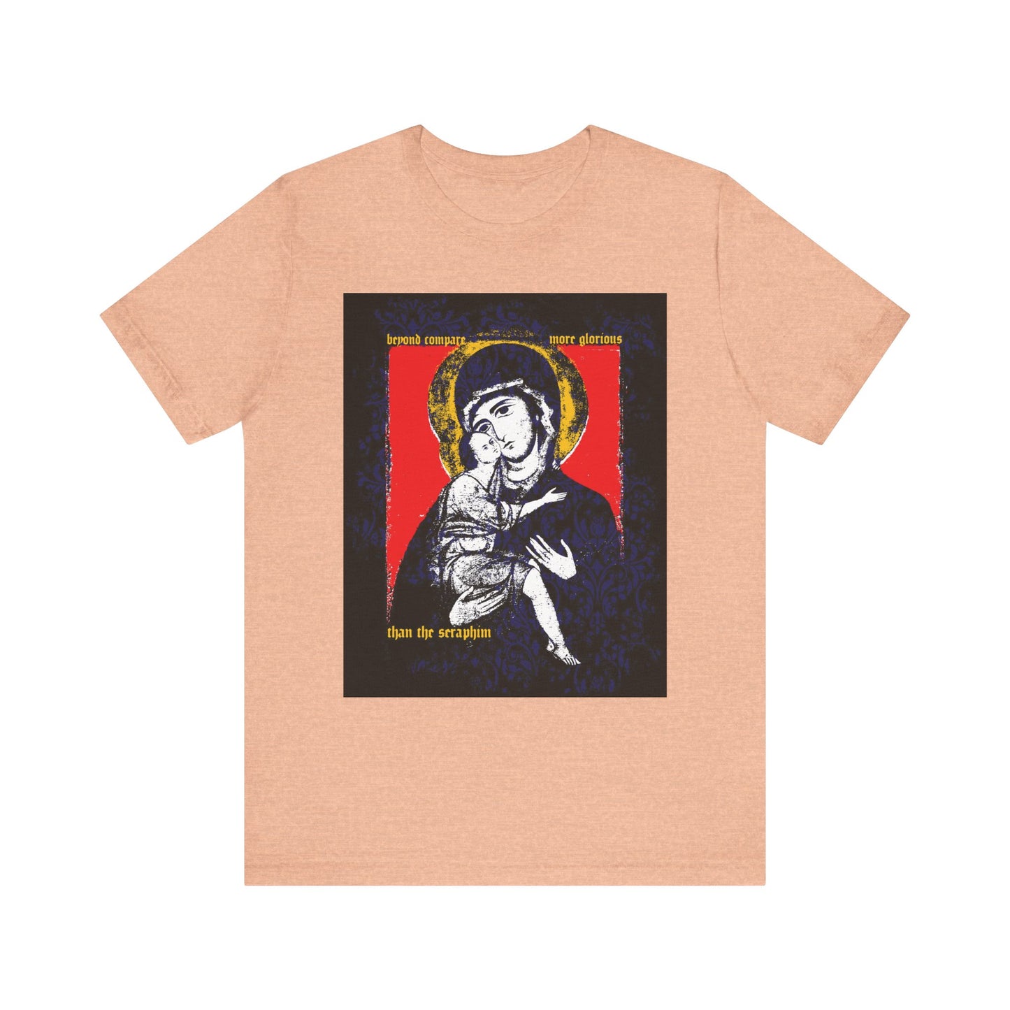 Heather peach t-shirt with the Vladimir Theotokos icon, floral texture, gold halos, and decorative Orthodox text: "Beyond Compare More Glorious Than the Seraphim." Lightweight cotton—perfect for expressing faith and devotion.