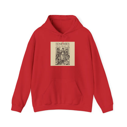 Red hoodie featuring a vintage black-and-white Shakespearean “Remember You Will Die” graphic on the chest, inspired by a classic woodcut illustration and evoking the Orthodox Christian memento mori tradition.