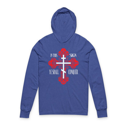 Heather True Royal hoodie featuring a red ornate Orthodox cross and the text "In This Sign Ye Shall Conquer" (In Hoc Signo Vinces, ICXC NIKA, Jesus Christ Conquers). Christian hooded shirt inspired by the Holy Cross.