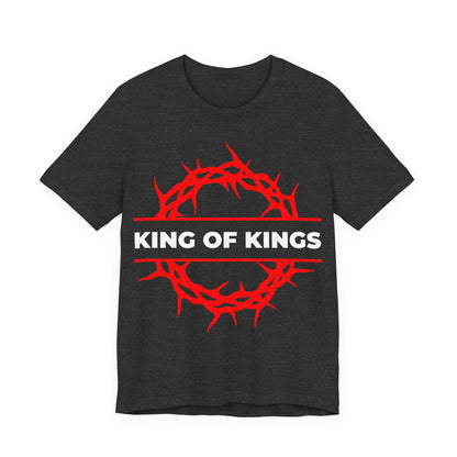 Dark Grey Heather unisex tee featuring a red crown of thorns and “KING OF KINGS” in white, inspired by Revelation 19:16—The King of Glory rides forth. Orthodox Christian cotton shirt.