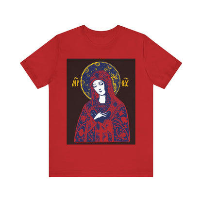 Bright red t-shirt featuring an iconographic design of the Theotokos inspired by Orthodox "Joy of All Joys Tenderness" iconography, with a golden halo and ornate details.
