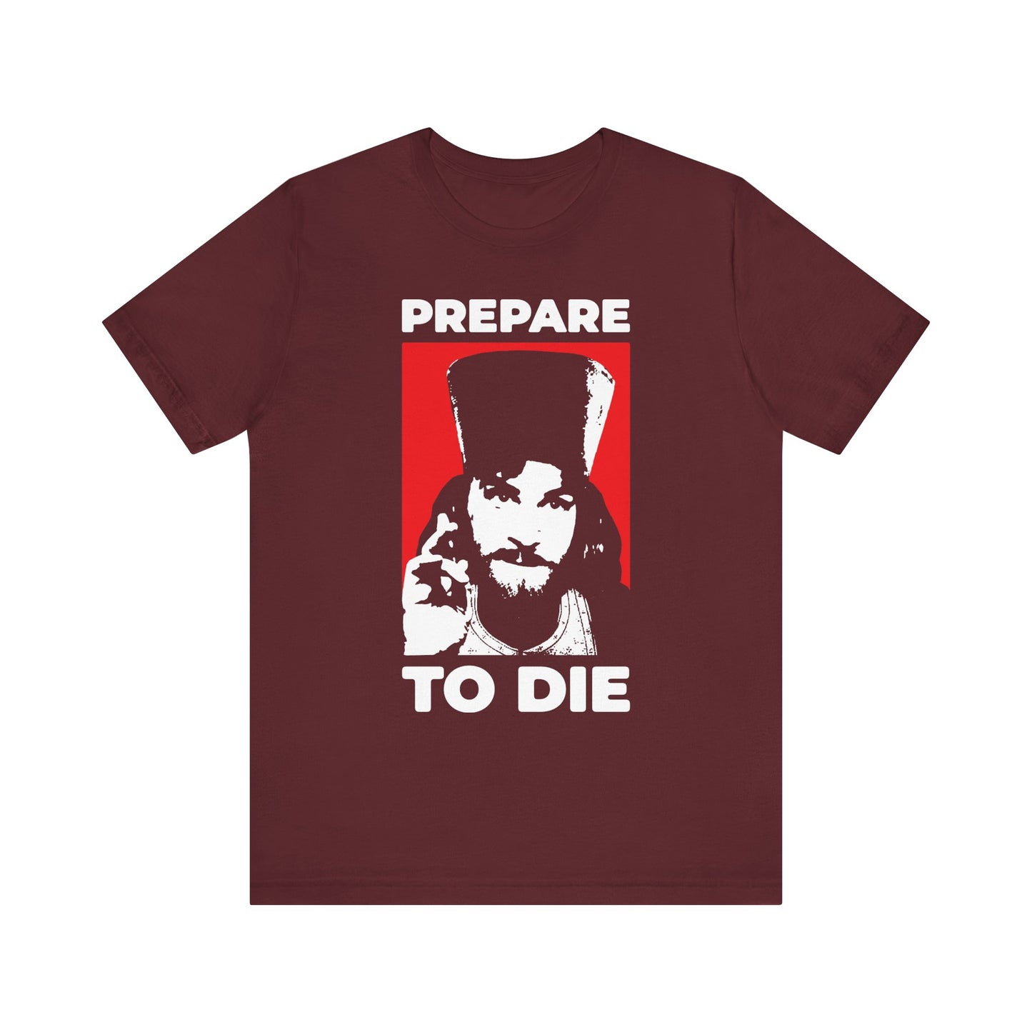 Maroon "Prepare to Die | Remember You Will Die" t-shirt featuring Inigo Montoya as an Orthodox priest giving a blessing on a red background, inspired by the teachings of St. Hesychius about recalling the hour of death and invoking the Lord Jesus Christ; lightweight cotton unisex design.