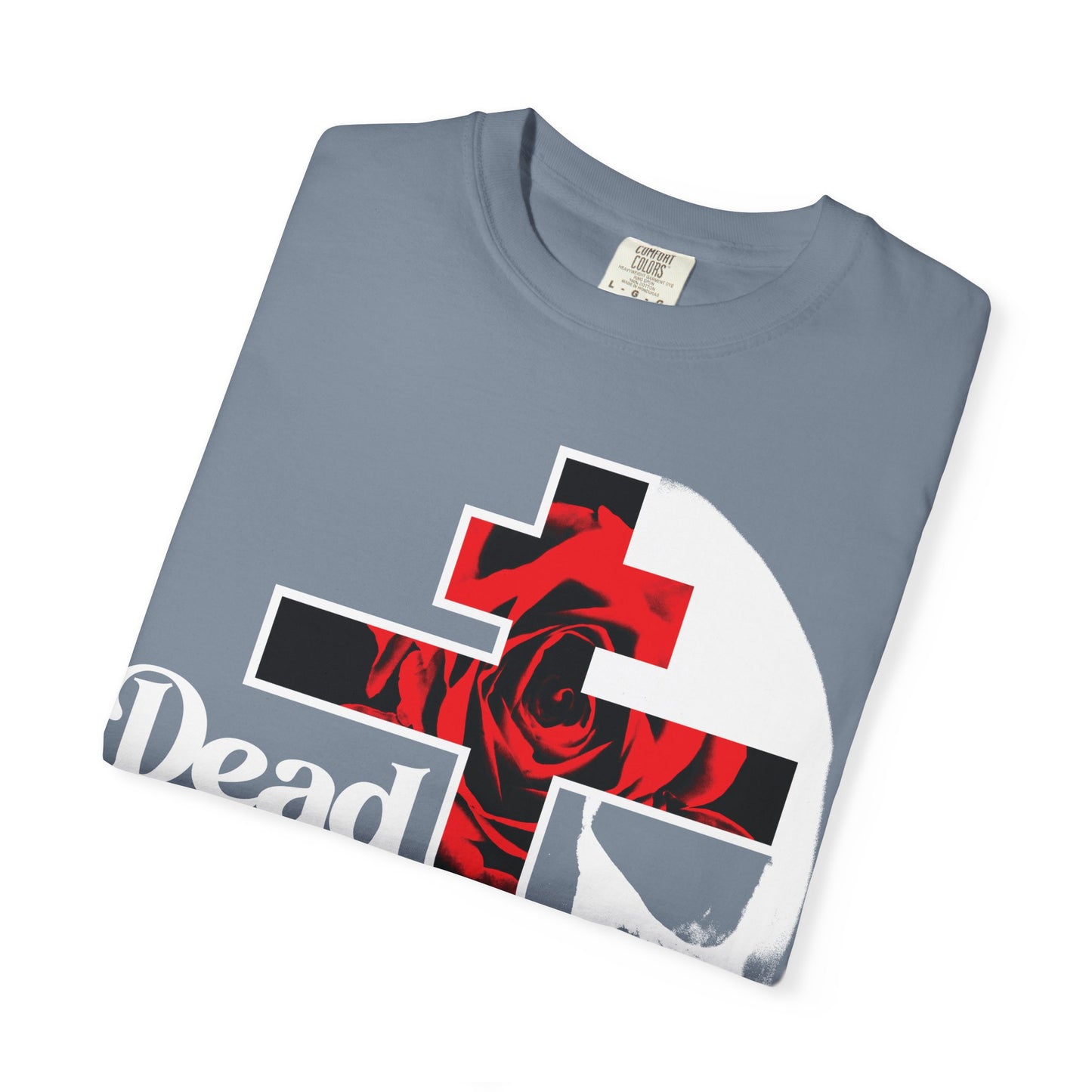 Folded gray "Dead to this World" tee features a flower cross, skull, and red rose design with 70s Gothic typography—Christian bestseller on heavyweight cotton.