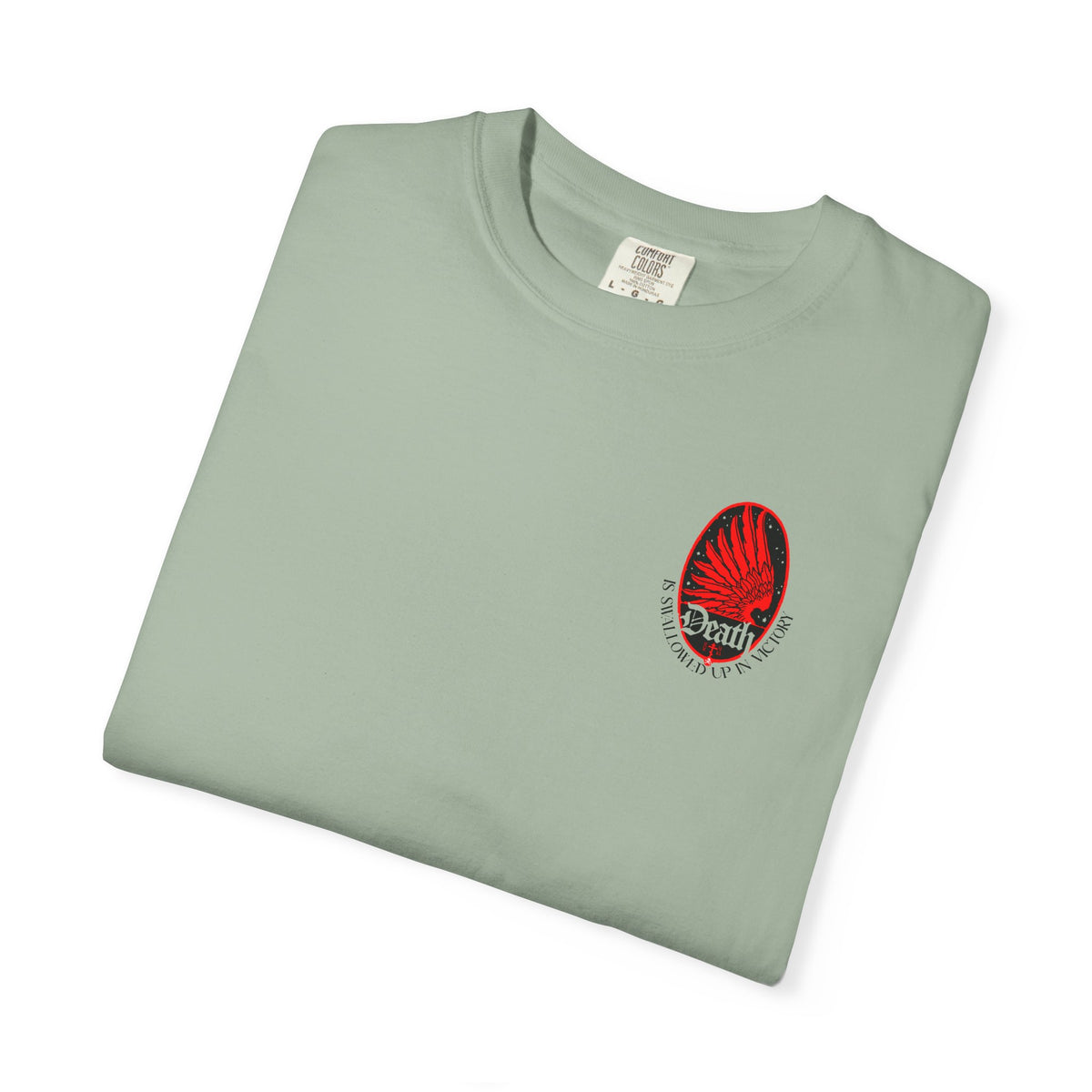 Sage green Death is Swallowed Up In Victory t-shirt with a red eagle wing graphic and the text: Death is swallowed up.
