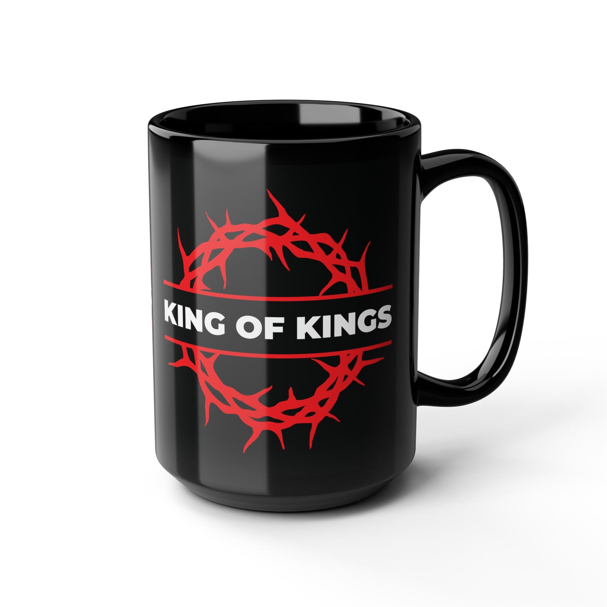 The "King of Kings Crown of Thorns" Black Mug features a bold red crown of thorns and KING OF KINGS text—a striking tribute to Christ the King, inspired by Revelation 19:16. Perfect for proclaiming faith daily.