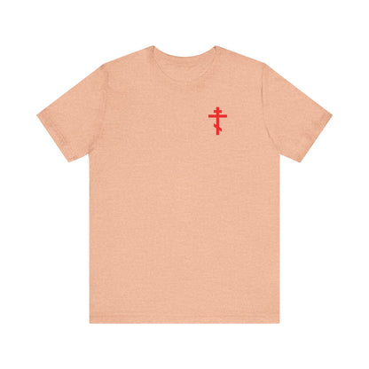 Heather peach unisex tee with a red cross on the front left chest, lightweight cotton. Inspired by St. John Climacus's "remembrance of death" teachings, features Crown of Thorns design on the back.