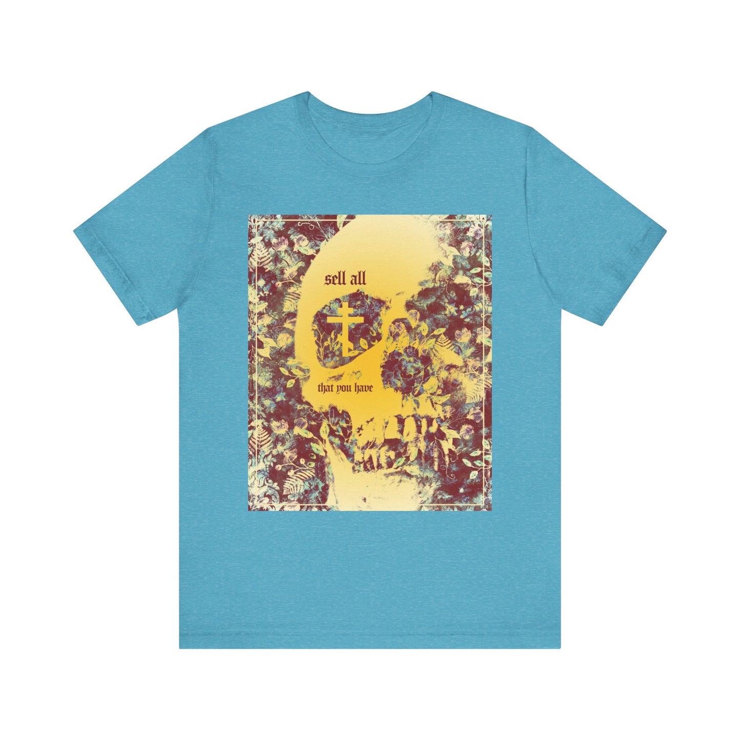 Heather aqua unisex tee featuring an Orthodox cross, yellow skull, and floral motifs with the phrase "Sell All That You Have"—a striking Christian ascetic design inspired by the call to seek the kingdom of heaven above all else.