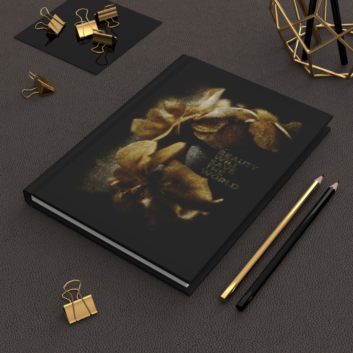 The "Beauty Will Save the World | Dostoevsky" Christian blank journal, featuring gold flowers and inspiring photography, celebrates Jesus Christ, Universal Creator & King—perfect for writing at your desk with pencils and gold clips.