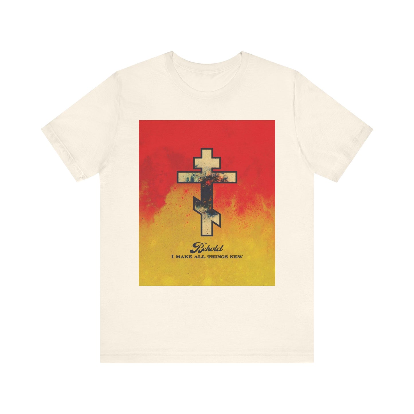 Natural unisex tee featuring a cosmic Orthodox cross on a red and yellow background, inspired by Revelation 21:5. Text on shirt: "Behold I make all things new." Lightweight cotton; perfect for faith-inspired style.
