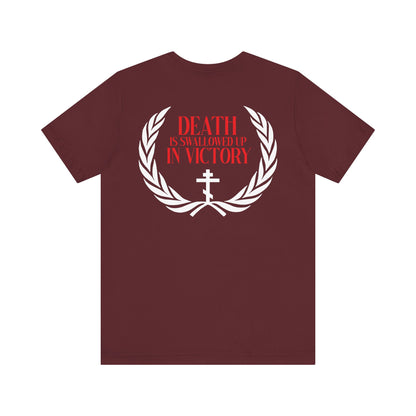 The Archangel Michael of the Apocalypse Iconographic / Death is Swallowed Up In Victory DOUBLE-SIDED Unisex T-Shirt features a maroon design with white laurel, red text, and cross, inspired by the Miracle at Colossae and Revelation 12:7-9.