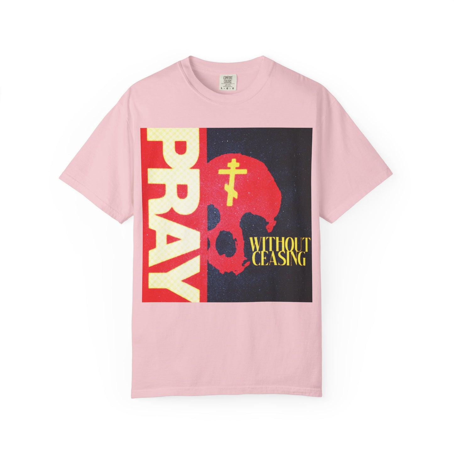 Blossom-colored "Pray Without Ceasing (1 Thess 5:16)" heavyweight cotton unisex t-shirt, featuring a striking red skull graphic with a yellow Orthodox cross and the words "PRAY" and "WITHOUT CEASING"—a bold statement of Christian faith.