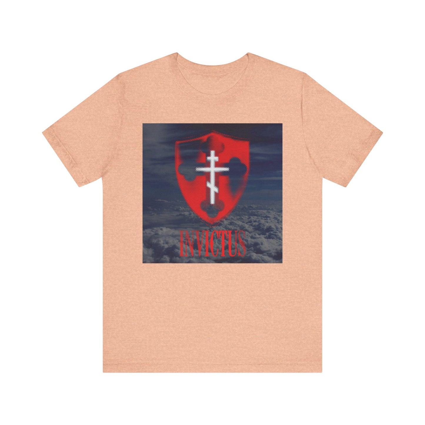 Heather Peach "Invictus White Orthodox Cross" lightweight cotton unisex tee featuring a glowing red halftone shield with a white cross graphic and clouds background, inspired by 1 Corinthians 15:54—embodying the spirit of “Christ Unconquered.”.