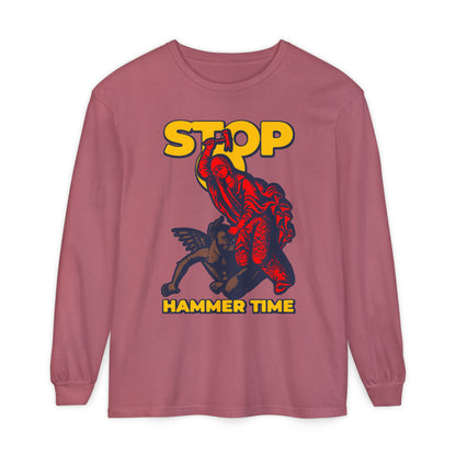 Red, blue, and yellow long-sleeve shirt featuring St Marina of Antioch beating the devil with a hammer and "Stop, Hammer Time" – a modern Orthodox meme-style Christian graphic.