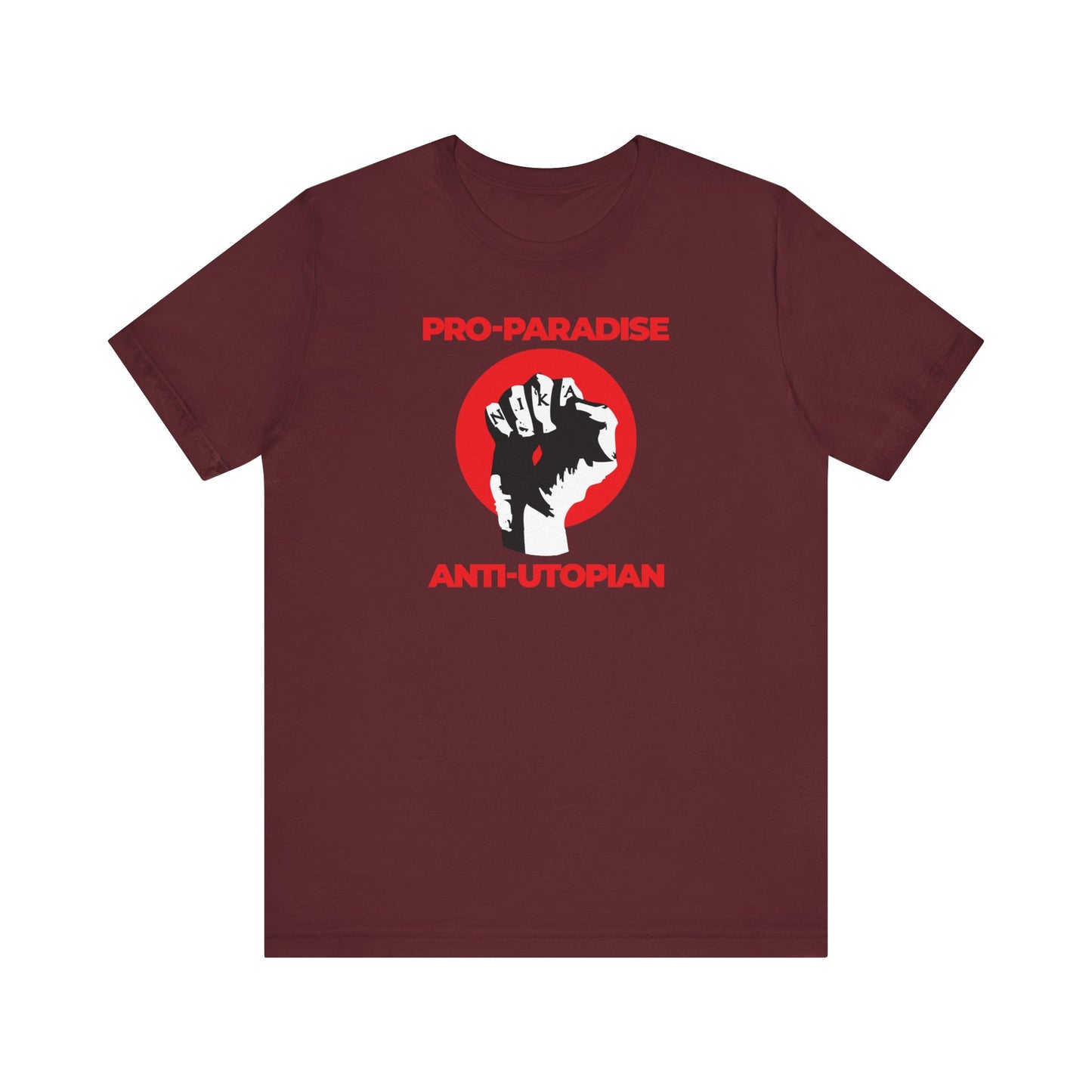 Maroon "Pro-Paradise Anti-Utopian" t-shirt featuring the NIKA fist and “Resist the Dominant Secular Paradigm” design on lightweight cotton, inspired by Seraphim Rose’s spiritual quest. Unisex fit.