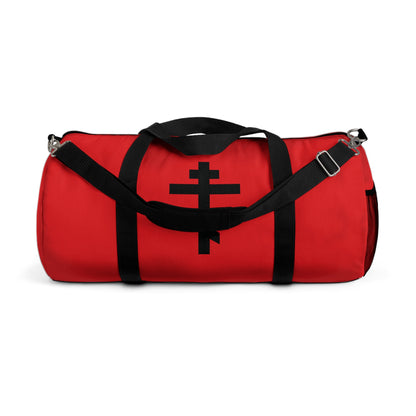 Red gym duffel bag with black straps and a black Orthodox Cross on the front, featuring "May I never boast, except in the cross of our Lord Jesus Christ" (Gal 6:14). Perfect for Orthodox Christians.