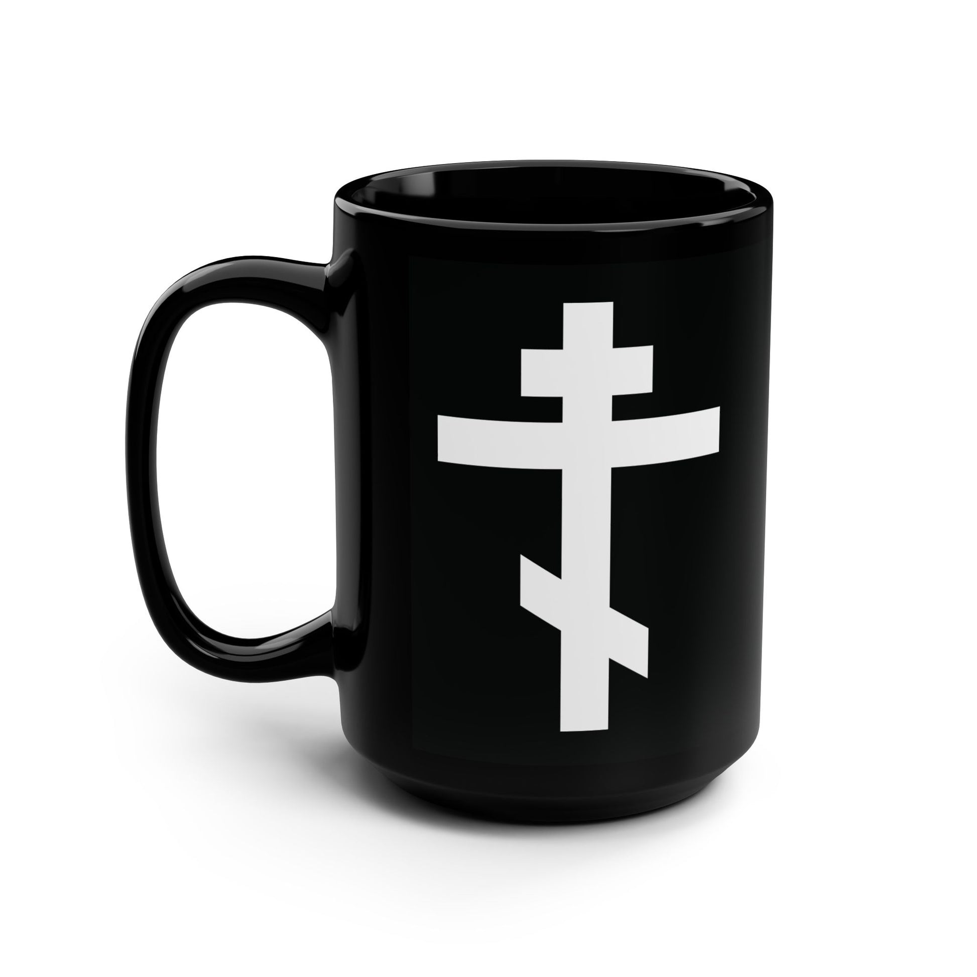 Black mug featuring a white Orthodox cross and the quote "May I never boast, except in the cross of our Lord Jesus Christ" (Gal 6:14), inspired by St. John of Kronstadt. Photographed on a white background.