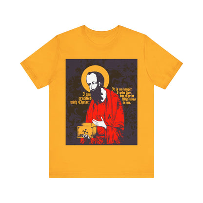 Gold Orthodox Christian T-shirt featuring an iconographic image of St Paul holding the Gospel and the phrase "I am crucified with Christ" (Galatians 2:20) in white and yellow.