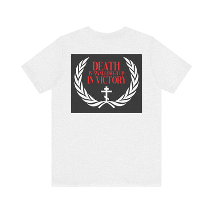 The Archangel Michael of the Apocalypse double-sided t-shirt features a laurel wreath, cross, and red “Death is swallowed up in victory” text, inspired by the Miracle at Colossae. Lightweight cotton unisex fit.