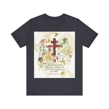 Heather Navy t-shirt with white and beige floral scrapbook-style cross, arts & crafts design, and inspiring St Irenaeus quote—ideal for fans of Orthodox Christian writings.