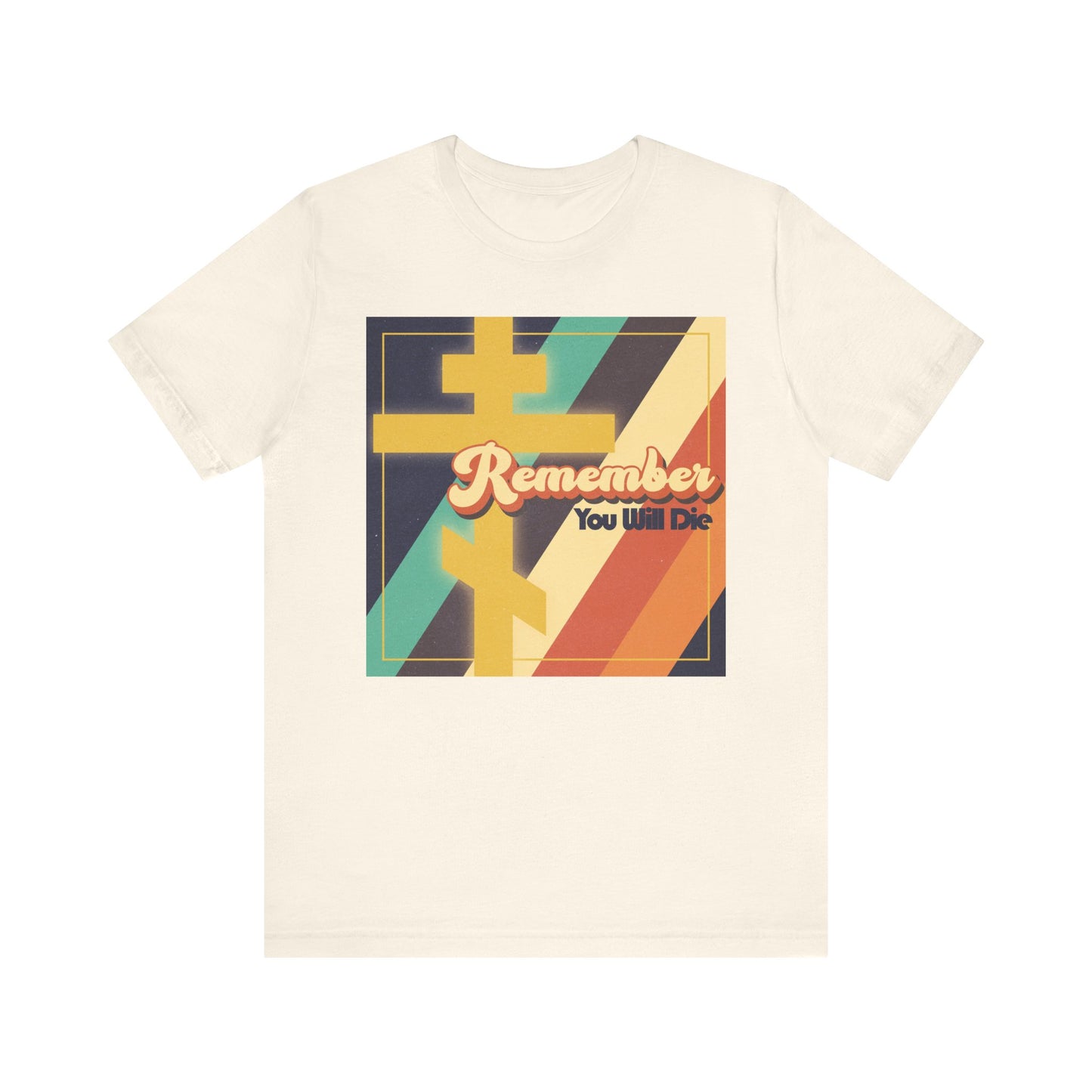 Natural-color t-shirt featuring the Remember You Will Die design in bold 70s-inspired colorful retro American typography, accented with an Orthodox cross—a lightweight cotton unisex tee that subtly nods to Christian prodigal themes reminiscent of Tuesday Matins reflections.