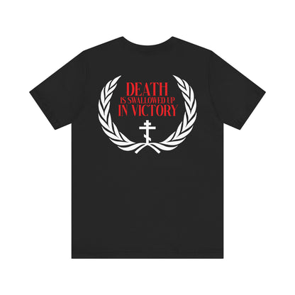 Black Archangel Michael of the Apocalypse iconographic t-shirt featuring a white laurel wreath, cross, and red "Death is Swallowed Up In Victory" text. Double-sided, lightweight cotton unisex design inspired by his miracle at Colossae.
