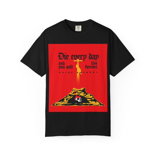 Black heavyweight cotton tee featuring St Anthony the Great’s quote, Golgotha cross, Skull of Adam, and bold red design: “Die Every Day and You Will Live Forever.” Unisex fit.