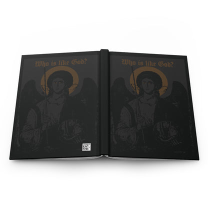 Featuring the “Who Is Like God? Archangel Michael Icono-Graphic” design—with a cross on the front left breast and rendered in black & bronze—this Goth Christian hardcover journal showcases an open book illustration of a dark angel with gold halo and the phrase “Who is like God?” on both pages, powerfully inspired by Orthodox Christian tradition and the protective presence of Archangel Michael.