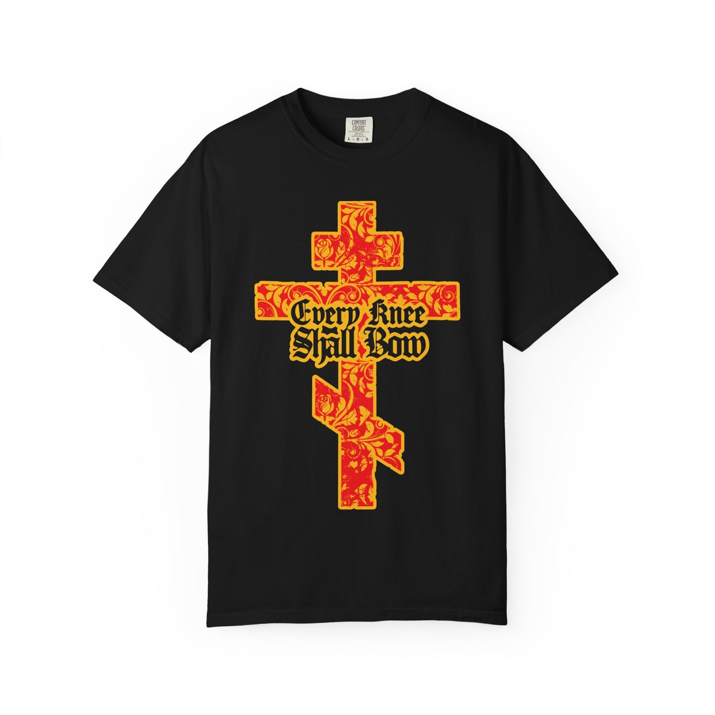 Black heavyweight cotton unisex tee featuring a gold and red floral texture Orthodox cross with gothic letters spelling out “Every Knee Shall Bow,” inspired by Isaiah 45:22-24 and Philippians 2:7-11.
