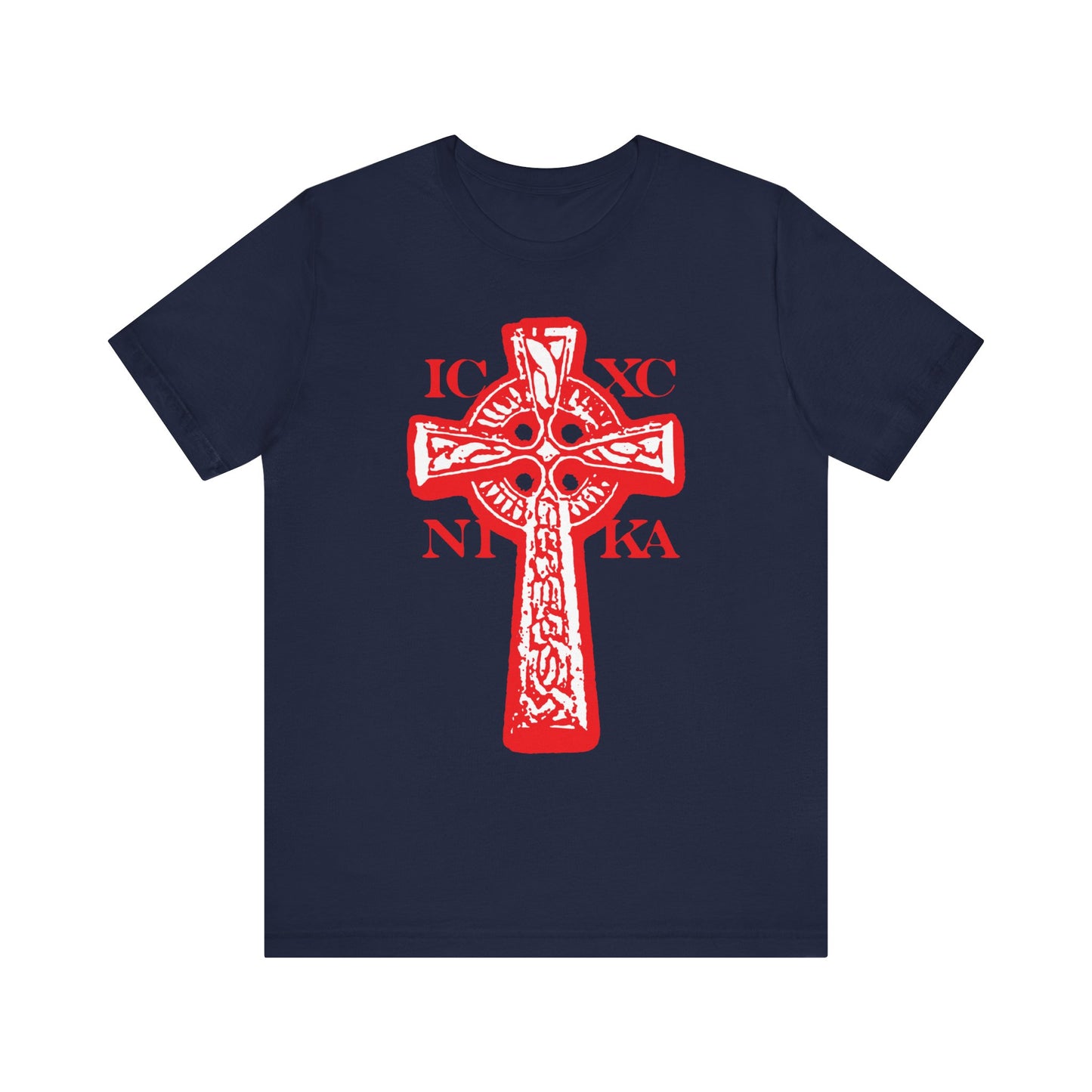Navy t-shirt featuring a bold black and white Celtic knotwork cross on a red background with the Greek letters ICXC NIKA, signifying "Jesus Christ Conquers," printed on the front.