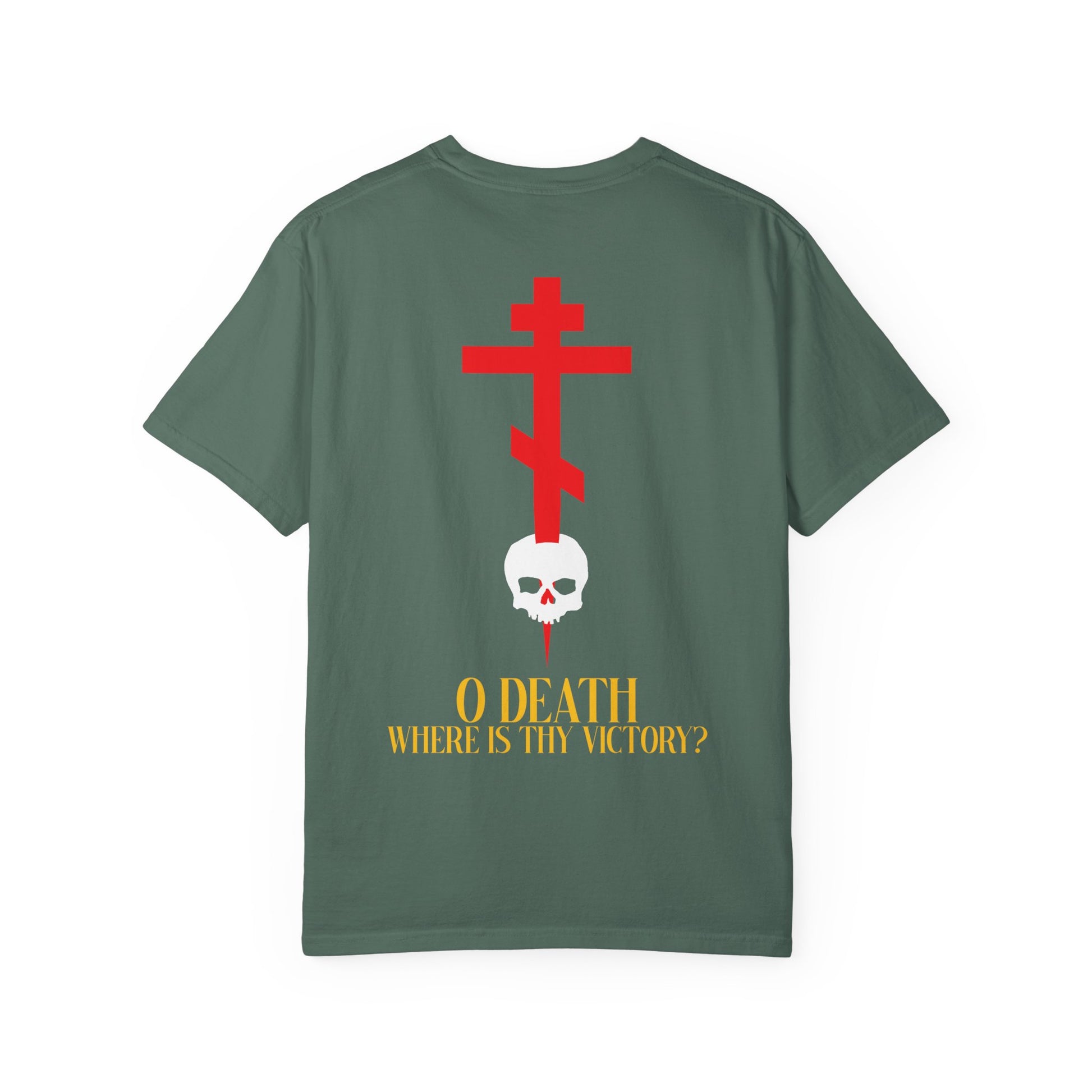 Introducing the "O Death Where is Thy Victory?" heavyweight cotton unisex tee: this green shirt features a red Orthodox cross on the front left breast, with a striking design of a cross stabbing a skull and bold yellow text on the back that proclaims O DEATH WHERE IS THY VICTORY?—a powerful statement of Resurrection and triumph over death.