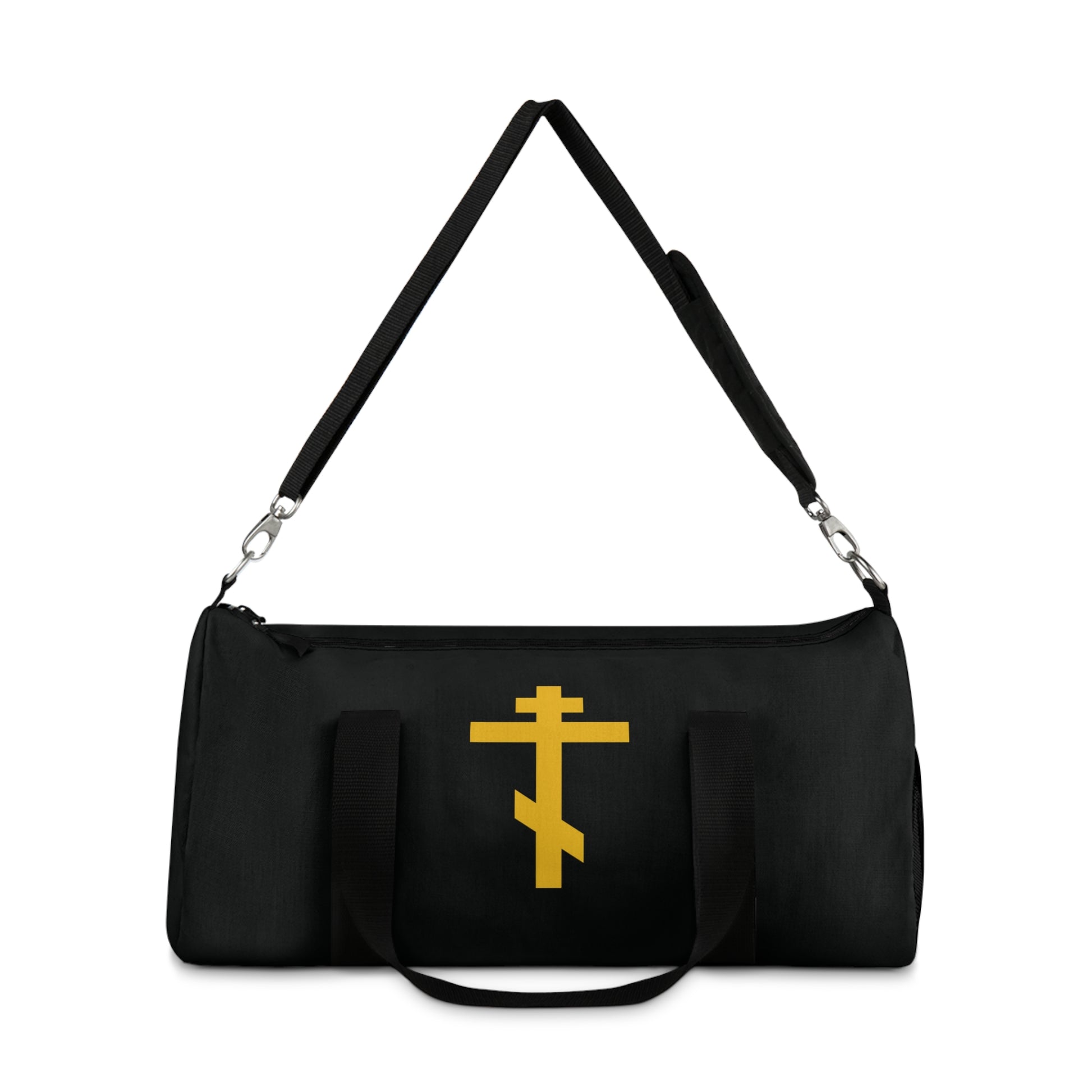 The "Yellow Orthodox Cross Black Background" gym duffel bag—Orthodox Christian design inspired by Galatians 2:20, features a gold cross and shoulder strap; photographed on white.