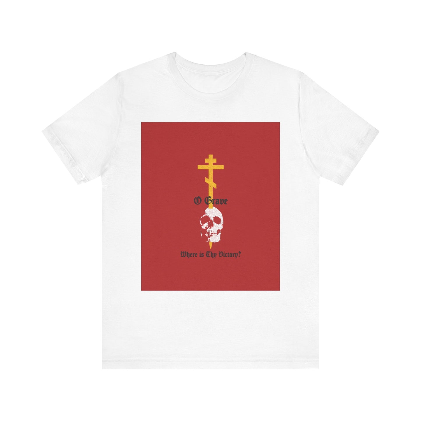 White lightweight cotton unisex tee featuring a gold Orthodox cross piercing a skull, red square, and the text "O Grave, Where Is Thy Victory? 1 Cor 15:55"—a striking testament to resurrection and the promise of immortality.