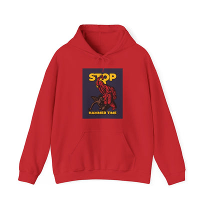 Red, blue, and yellow hoodie featuring St. Marina of Antioch beating the devil with a hammer and the phrase "Stop, Hammer Time"—a modern Orthodox meme for fans of quirky Christian style.