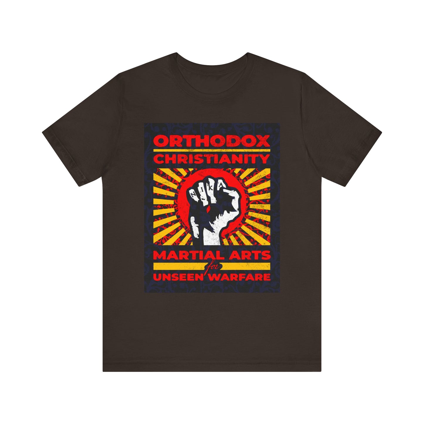 Brown lightweight cotton unisex tee featuring the NIKA Jesus fist on a colorful sunburst, with bold text: Orthodox Christianity: Martial Arts for Unseen Warfare—honoring the spiritual struggle and Christian virtue so often taught by Archbishop Averky.