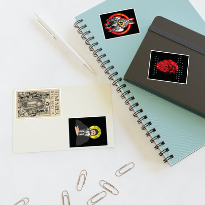 Two notebooks, a pen, and Bestseller Orthodox Sticker Mix No. 4 on a white surface.