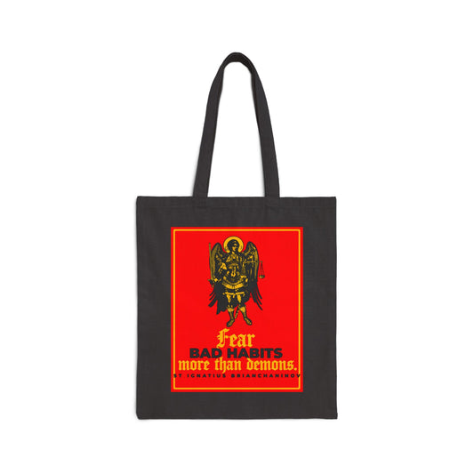 Black cotton tote bag featuring an Archangel Michael icono-graphic and St. Ignatius Brianchaninov’s quote: "Fear bad habits more than demons." A powerful Orthodox reminder for the ongoing spiritual battle.