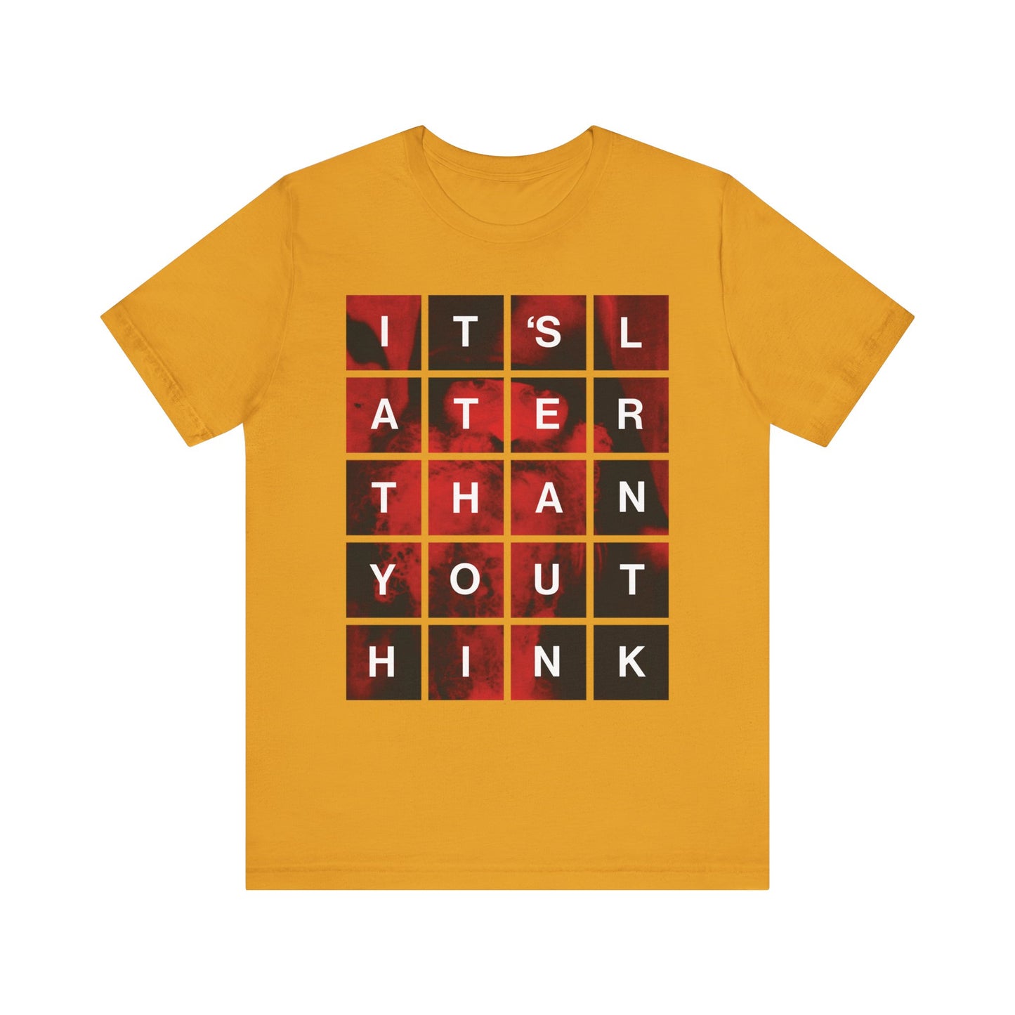 Mustard-colored "It's Later Than You Think" lightweight cotton unisex tee featuring a modern block design inspired by St Seraphim Rose—an American Orthodox Christian saint—serves as a subtle reminder to reflect on salvation and the Kingdom of God.