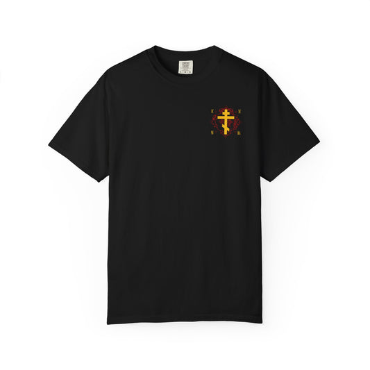 Black heavyweight cotton unisex t-shirt featuring a small ICXC NIKA yellow Orthodox cross on an ornate red background design, inspired by Christ Conquers, on the upper left chest.