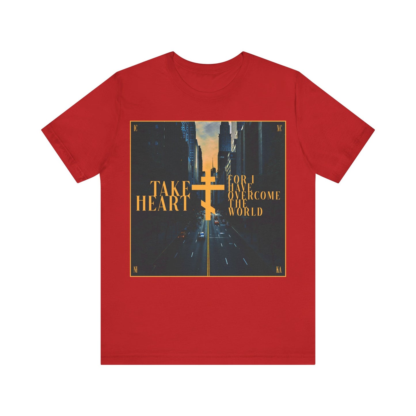 Red “Take Heart, For I Have Overcome the World (John 16:33)” Orthodox Christian cotton t-shirt features a modern city street scene design—a reminder that joy can follow sorrow.