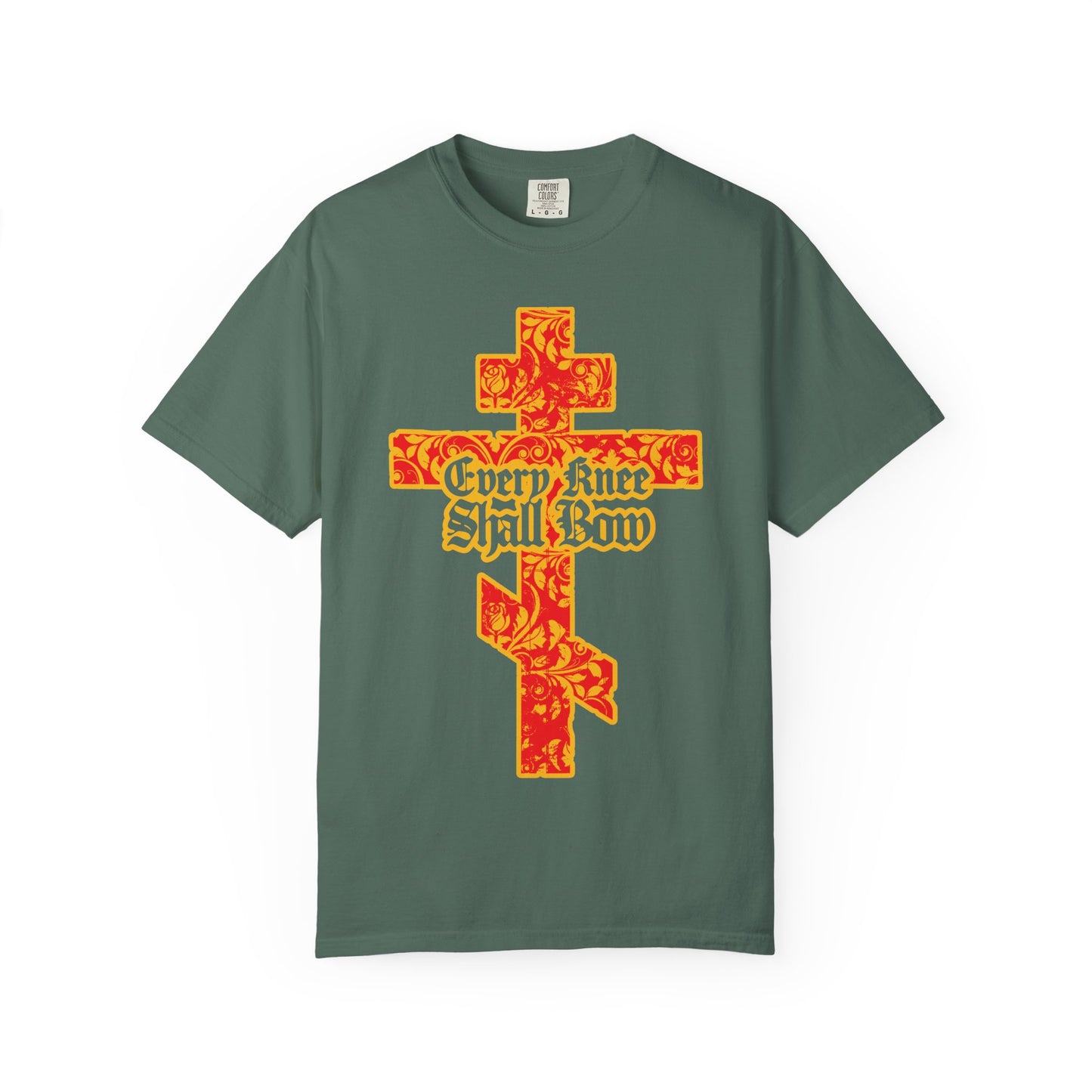 Blue Spruce heavyweight cotton unisex tee featuring a gold and red floral-textured Orthodox cross and gothic lettering with the phrase “Every Knee Shall Bow” across the front, inspired by Isaiah 45:22-24 and Philippians 2:7-11.