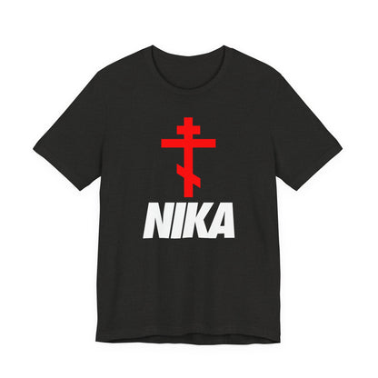 Black Heather t-shirt with a red Orthodox cross and bold white NIKA text, inspired by Christian iconography. Features a minimalist design and mashup style for an athletic, ascetic look.