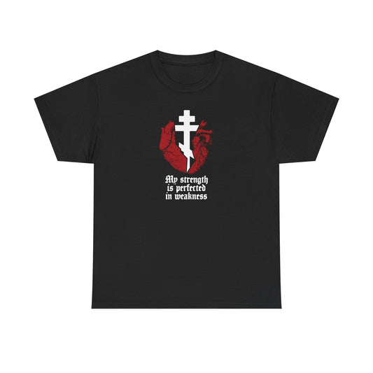 Black “My Strength is Perfected in Weakness (2 Corinthians 12:9)” t-shirt featuring a broken heart with a cross and gothic text—an Orthodox Christian heavy cotton tee inspired by faith and finding strength in weakness.
