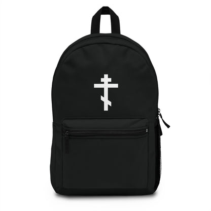 Black backpack featuring a white Orthodox cross and the inscription "May I never boast, except in the cross of our Lord Jesus Christ" (Gal 6:14). Orthodox Christian design inspired by faith.