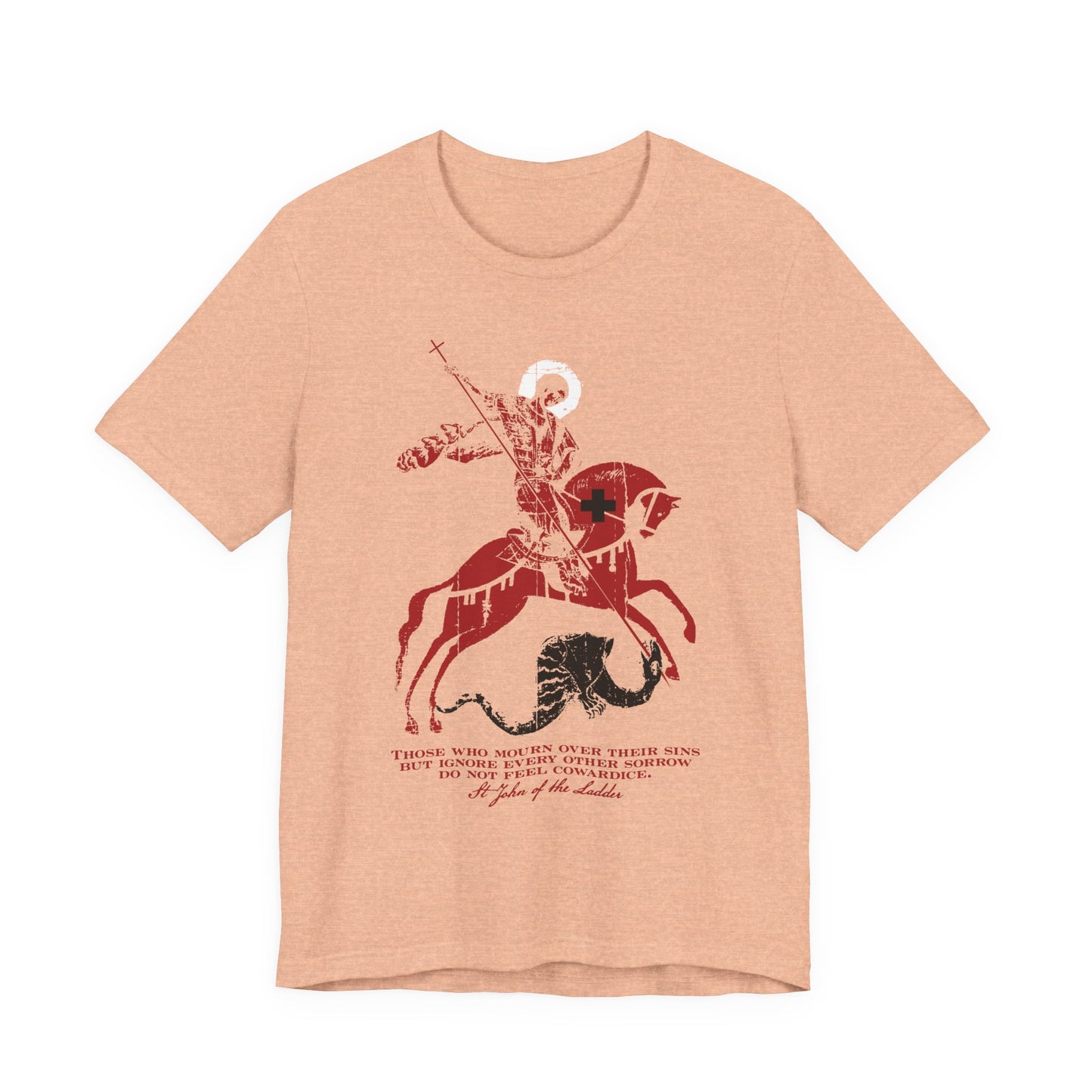 Heather Peach t-shirt featuring a graphic of St George slaying the dragon, inspired by St John Climacus and the theme “Those Who Mourn Over Their Sins,” with text beneath the illustration.
